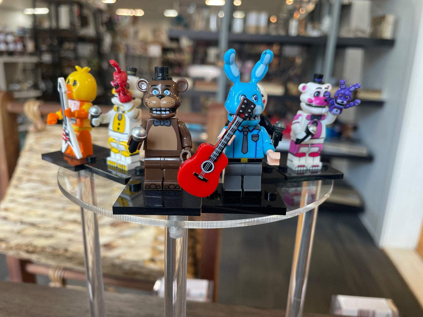 Five Nights at Freddies: Freddy, Chica w/ Guitar, The Puppet, Freddy w/ Red Bonnie, Freddy w/ Purple Bonnie, Bonnie (Security Guard). $6 Each Buy 5 get 1 FREE!!!