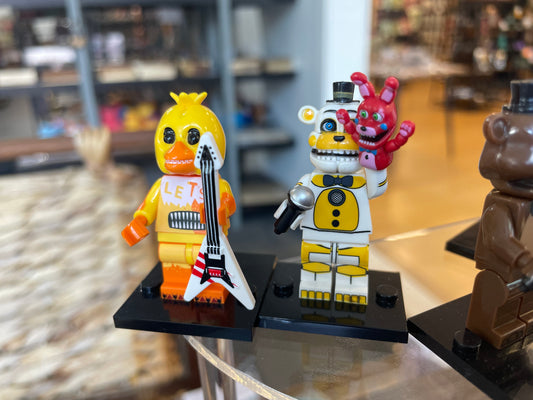 Five Nights at Freddies: Freddy, Chica w/ Guitar, The Puppet, Freddy w/ Red Bonnie, Freddy w/ Purple Bonnie, Bonnie (Security Guard). $6 Each Buy 5 get 1 FREE!!!