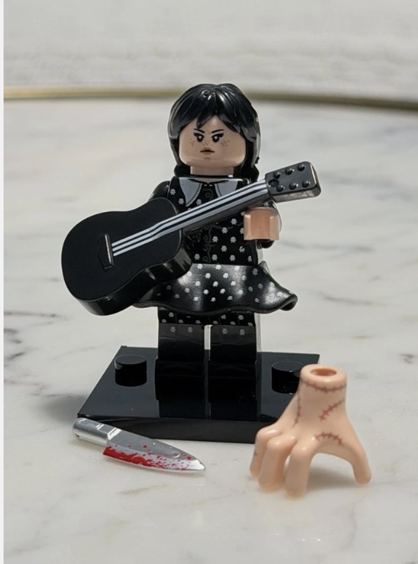 Adams Family: Wednesday w/ Guitar (White Polka Dots). All Figures ON WHOLE SITE are Buy 5 Get 1 Free