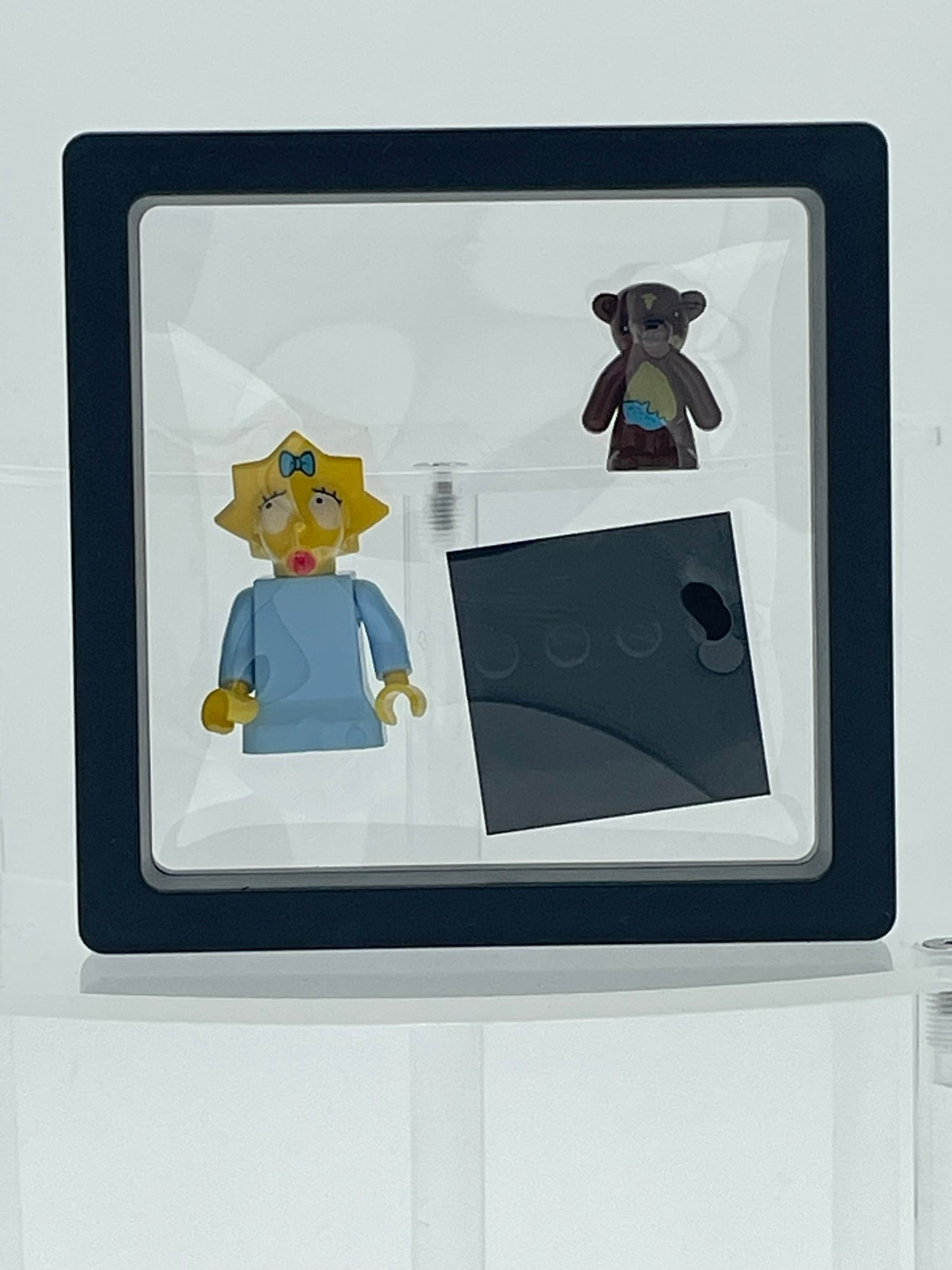 The Simpsons: Maggie Simpson w/ Teddy.