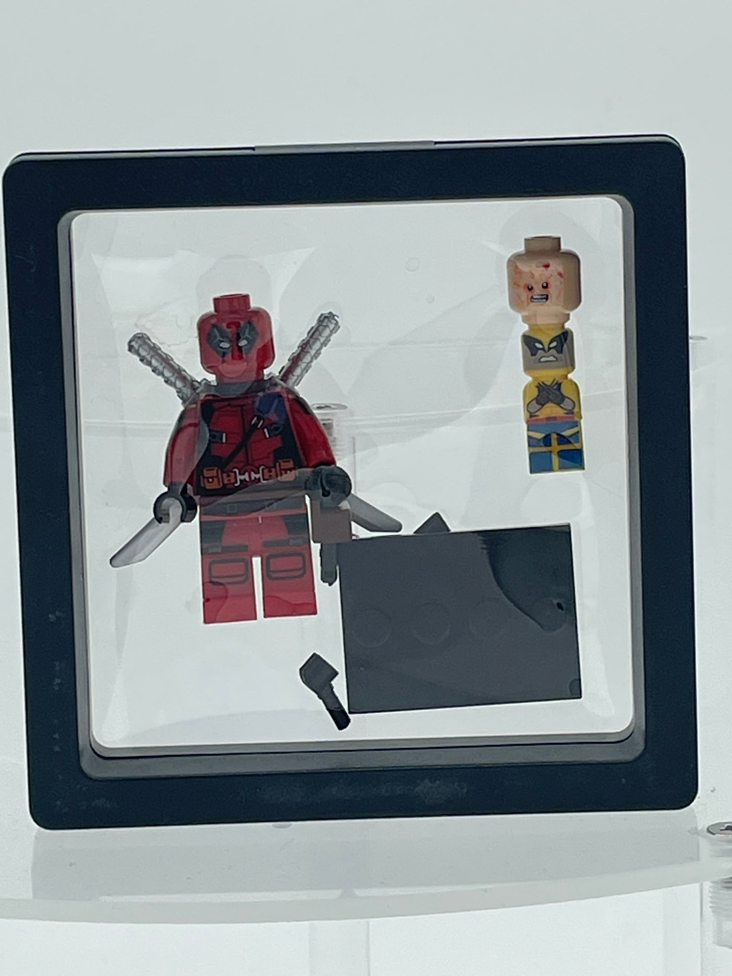 Marvel: Deadpool w/ Mini Wolverine.
