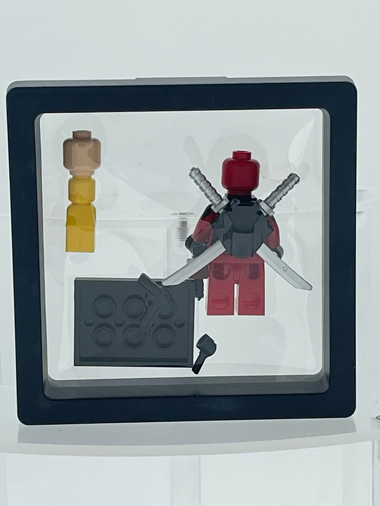 Marvel: Deadpool w/ Mini Wolverine.