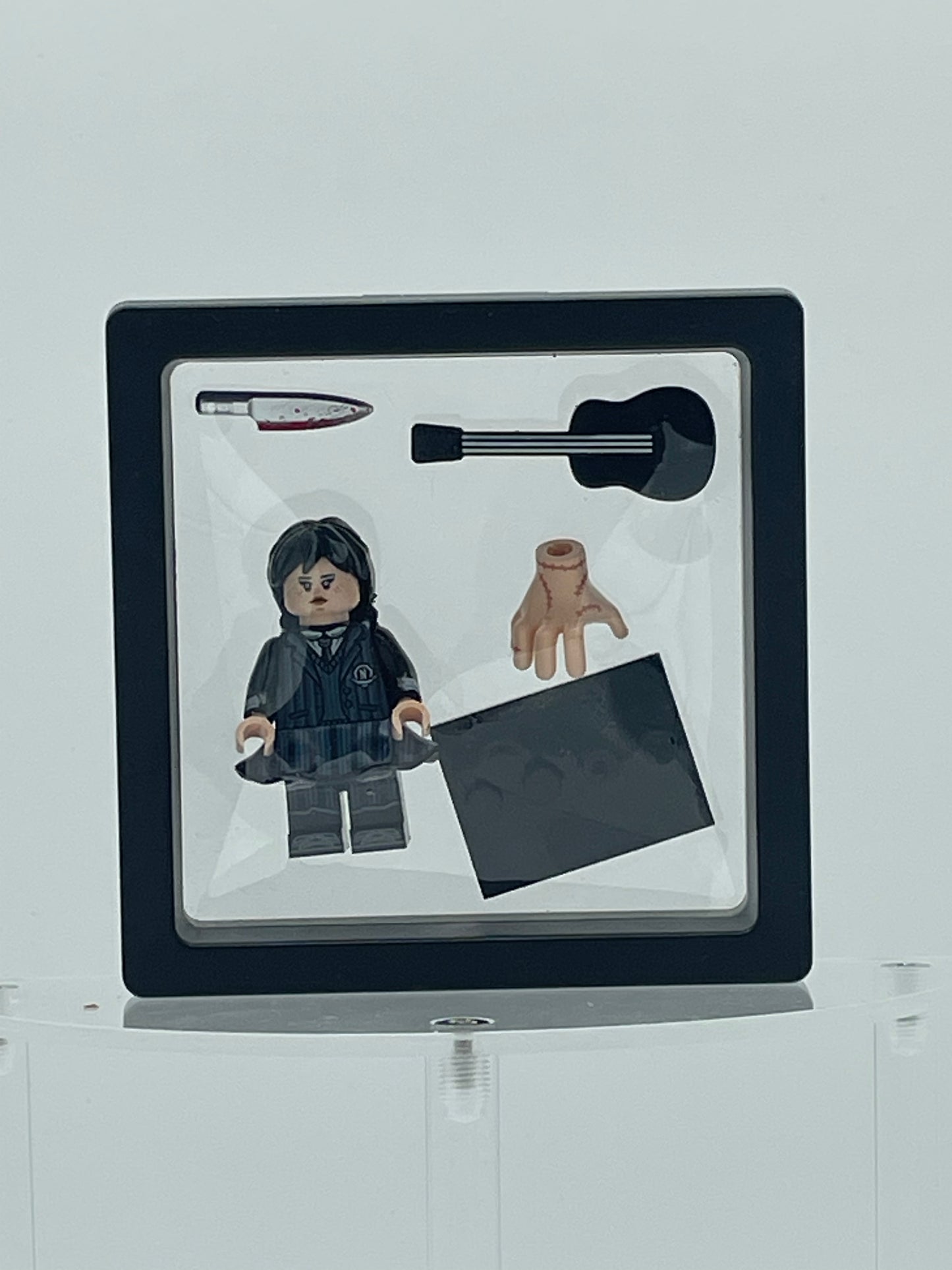 Adams Family: Wednesday Adams w/ Guitar (Black). All Figures ON WHOLE SITE are Buy 5 Get 1 Free